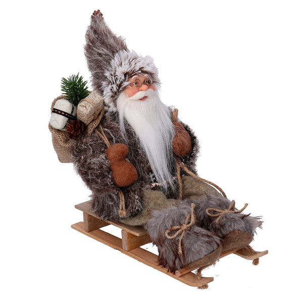 Weihnachtsmannpuppe aus Stoff auf braunem Schlitten 33x12xh30 cm online