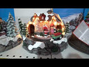 Weihnachtsspieluhr Santa's House 24x23x18 cm aus Harz mit Lichtern, Geräuschen und Bewegung